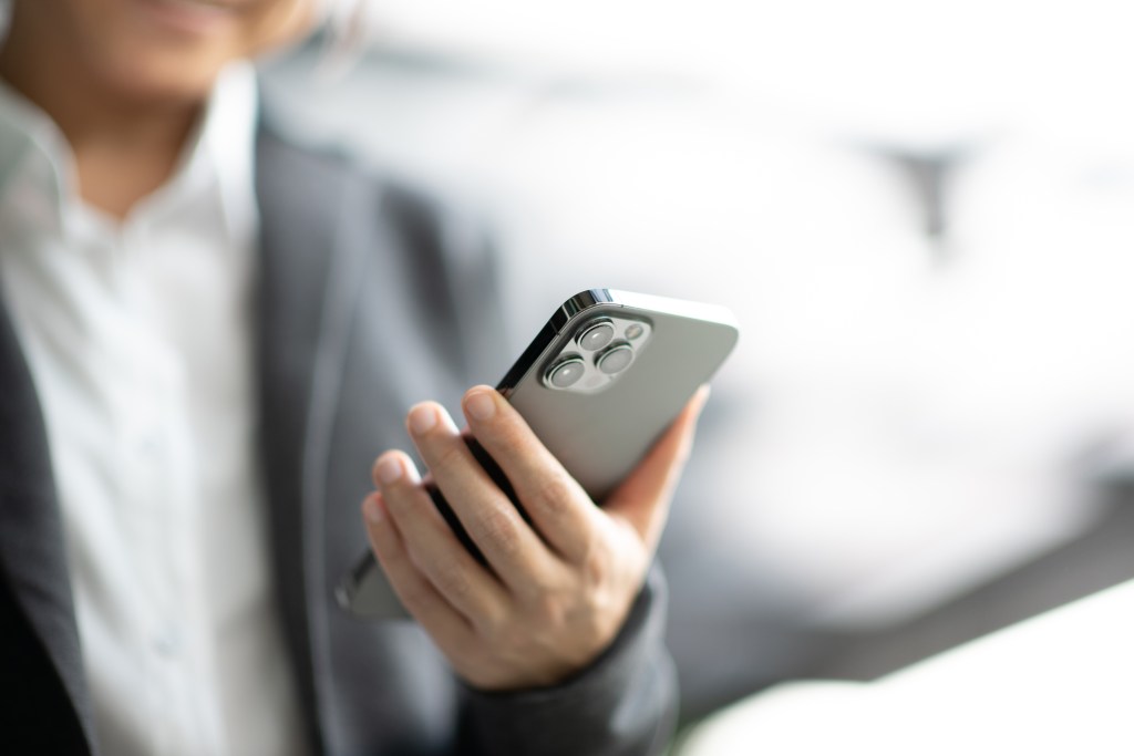 Entrepreneur who has an iPhone 12 Pro Max in Bangkok, Thailand